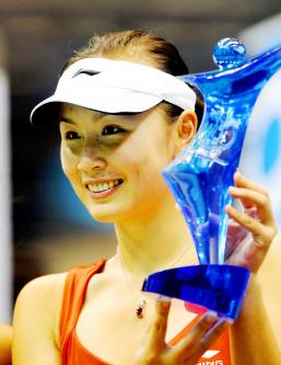 China&#39;s <b>Peng Shuai</b> poses for photographers with the trophy after winning the <b>...</b> - P20-101108-002