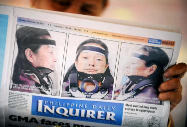 Massacre victims' families sue Arroyo - Taipei Times