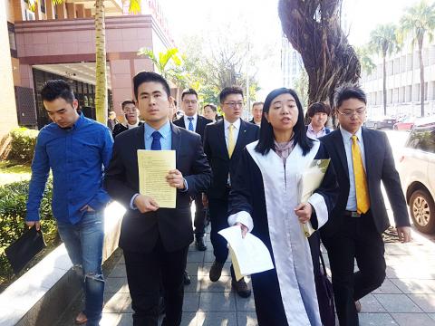 Image result for Lin, New Party spokesman Wang Ping-chung (王炳忠) and fellow party Youth Corps members Hou Han-ying (侯漢廷) and Chen Shu-chun