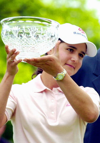 lorena ochoa of mexico holds the trophy after winning the