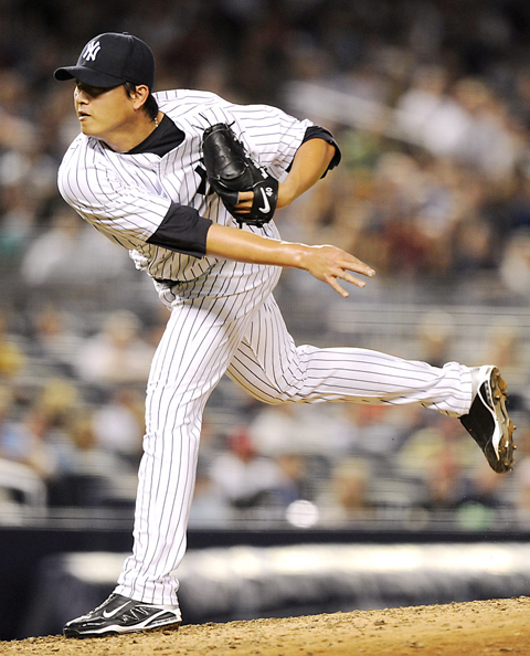 Wang pitches relief stint as Yankees lose to Phillies - Taipei Times