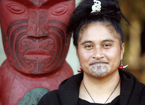 Modern Maori womans chin tattoo  Masks of the World
