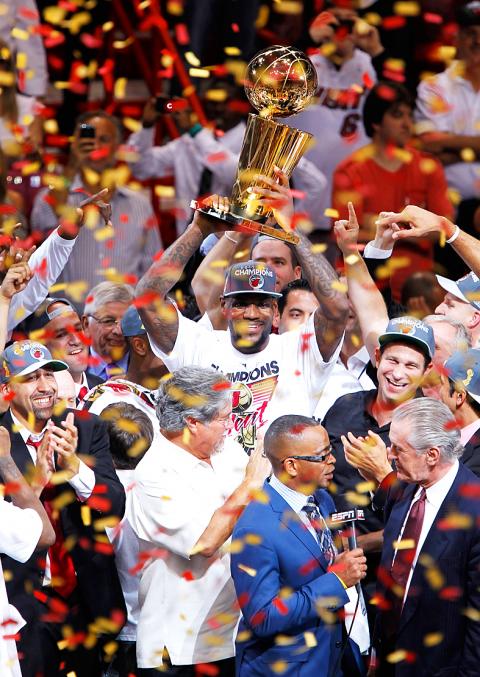 LeBron James with the 2012 NBA Championship & MVP Trophies Game 5 of the  2012 NBA Finals