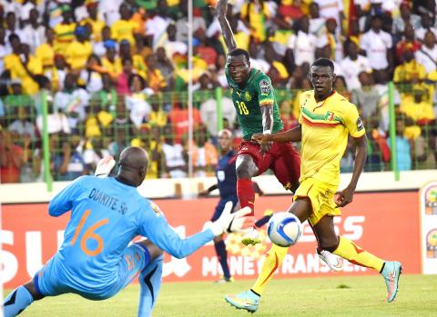 Ivory Coast and Cameroon hang on for 1-1 draws - Taipei Times