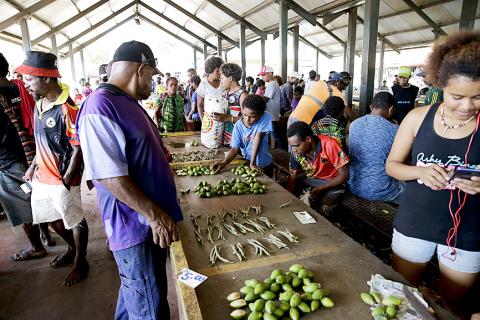 buai at the market, buai is the legal drug of choice in PNG…