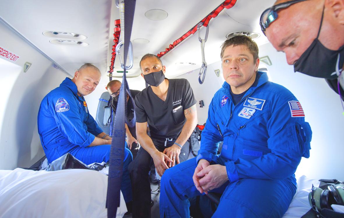 SpaceX capsule, NASA astronauts return to Earth Taipei Times