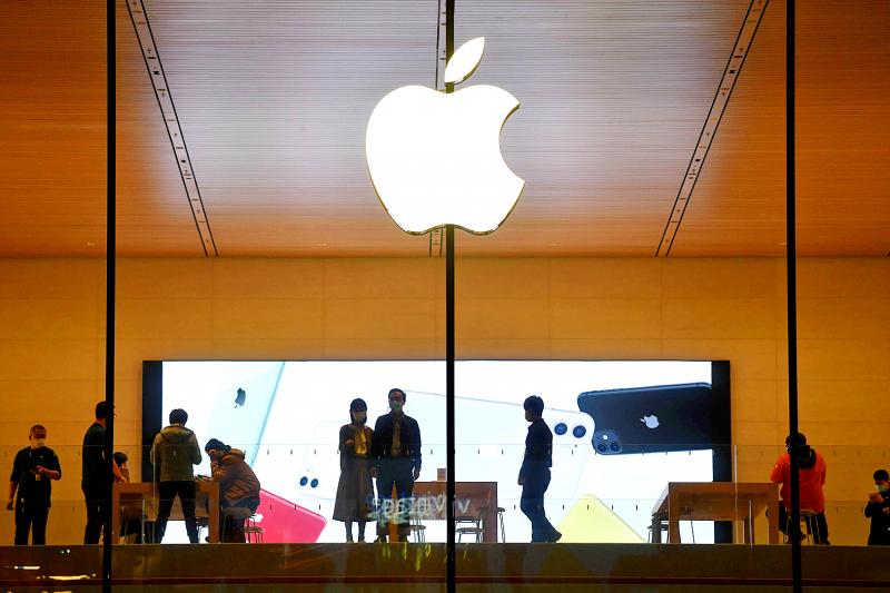 Apple shares fall as iPhone sales dip weighs on record quarterly results