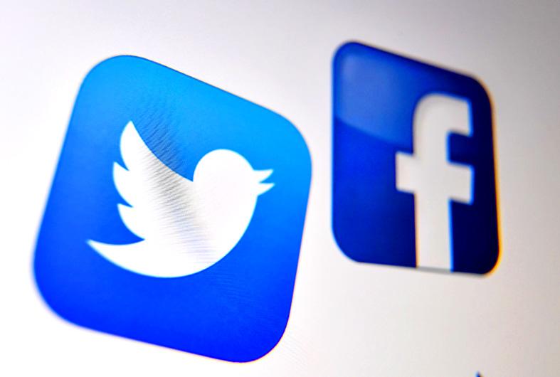 Facebook, Twitter could face UK fines over content - Taipei Times