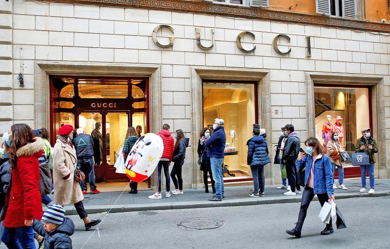 gucci store sales