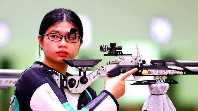 2. "The Top 10 Asian Female Shooters with Blonde Hair" - wide 5