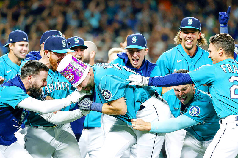 Raleigh ends Mariners' 21-year playoff drought - Taipei Times