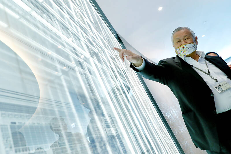 Macronix slashes capital expenditure - Taipei Times