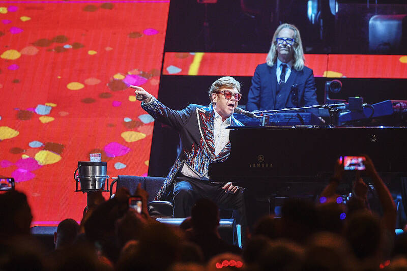 British singer-pianist Elton John gets emotional at final concert