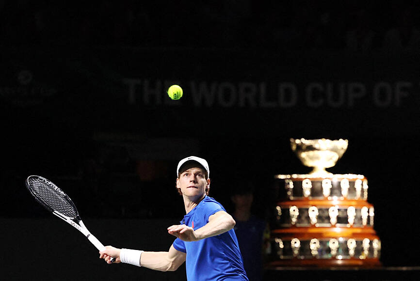 Jannik Sinner of Italy plays a forehand in his quarter final match