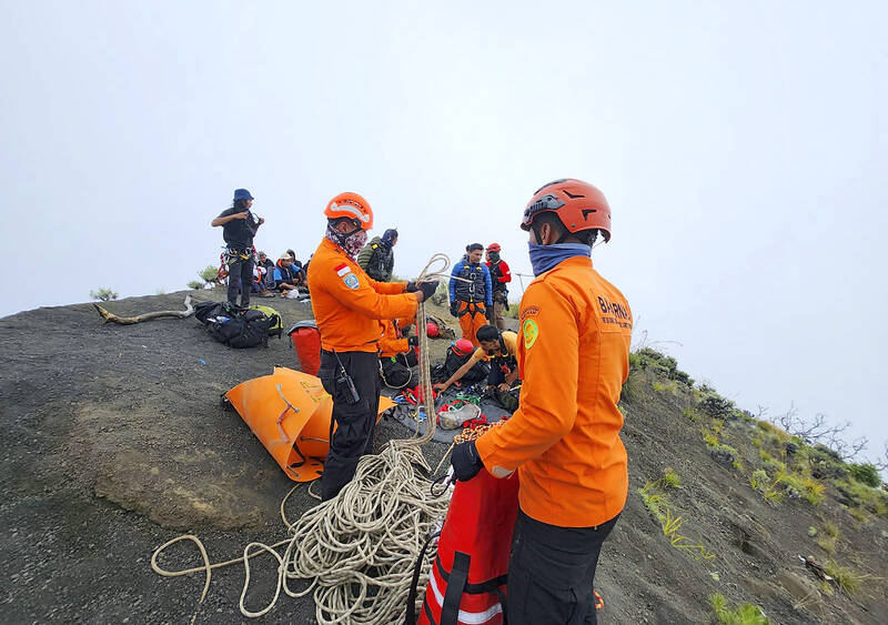 Indonesia races to rescue hiker stranded on volcano