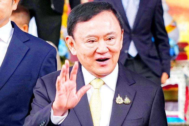 Ex-Thai PM Thaksin cleared of royal insult charges